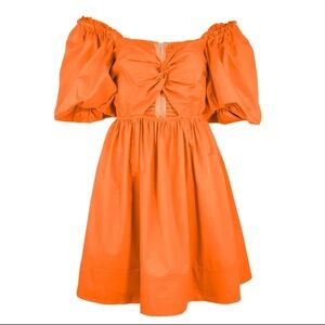 Off the shoulder twist front keyhole waist knot puff sleeve mini dress. Orange.